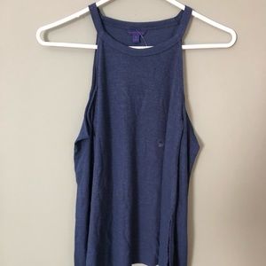 No shoulder blue long sleeve shirt.